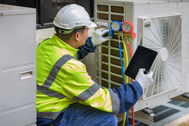 Professional Hvac technician working in Portage, IN